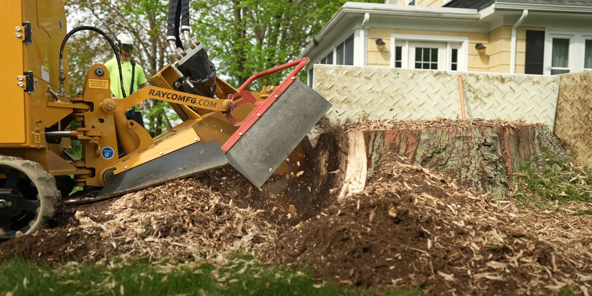 Complete stump removal services in Poinciana Professional stump grinding equipment in action for complete tree removal